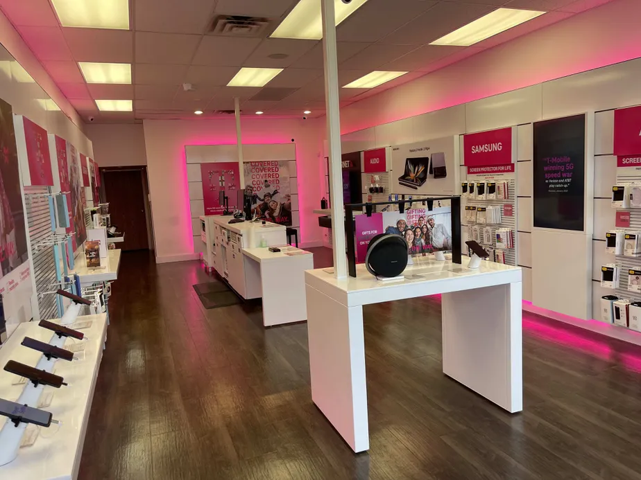 Interior photo of T-Mobile Store at W 14 Mile Rd & Loop Rd, Commerce Township, MI
