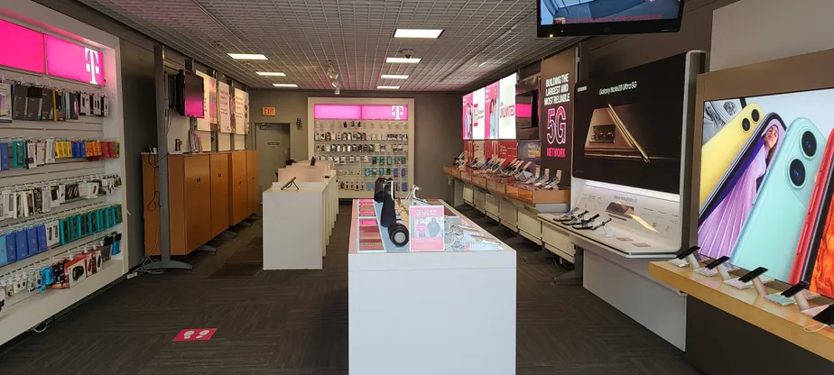 Interior photo of T-Mobile Store at Grand Ave & N Hunt Club Rd, Gurnee, IL