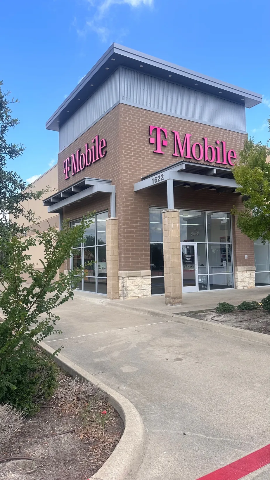  Exterior photo of T-Mobile Store at Rudder's Landing, Bryan, TX 