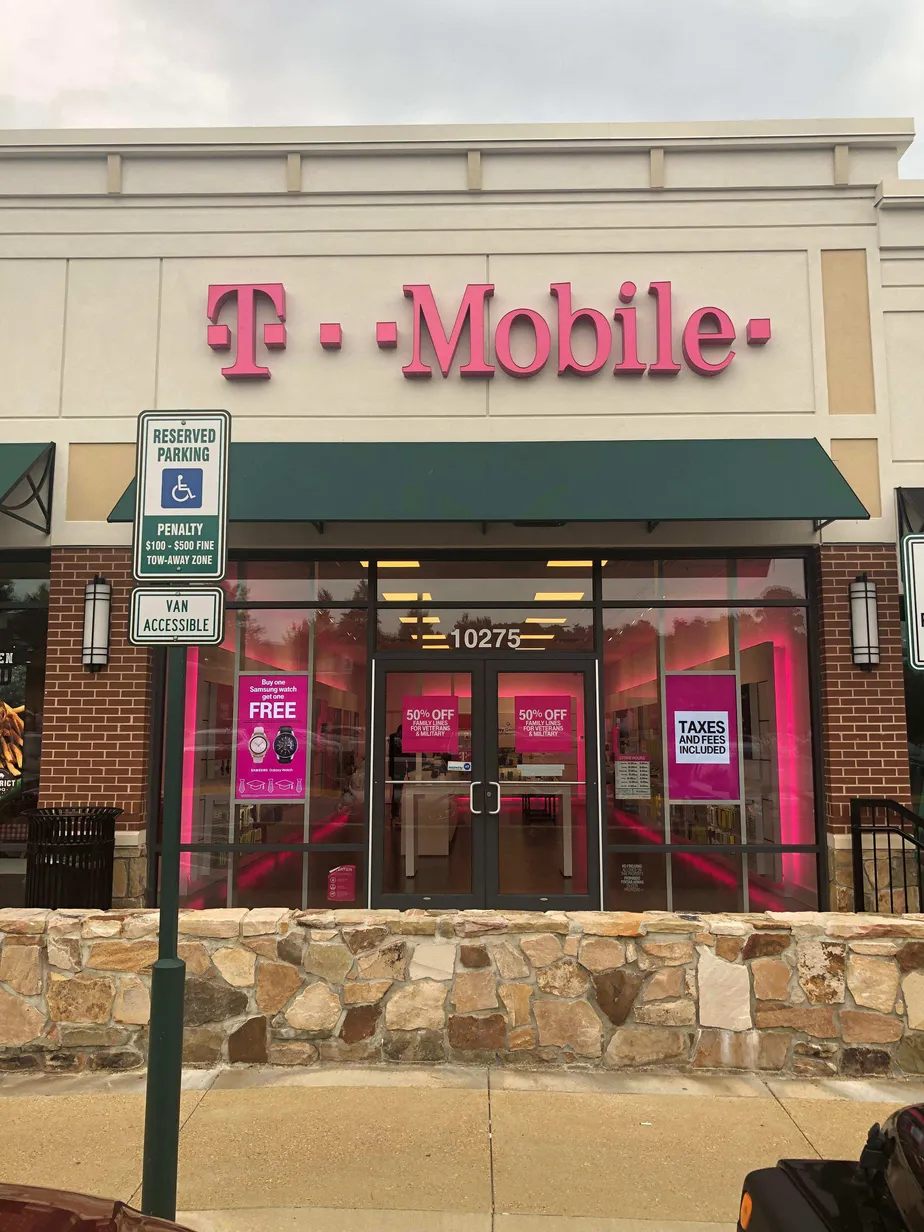 Exterior photo of T-Mobile store at Bristow Center Dr & Linton Hall Rd, Bristow, VA