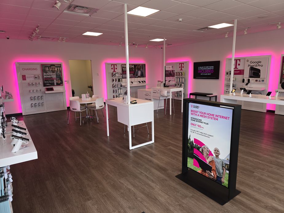 Interior photo of T-Mobile Store at Morton & Westgate, Jacksonville, IL
