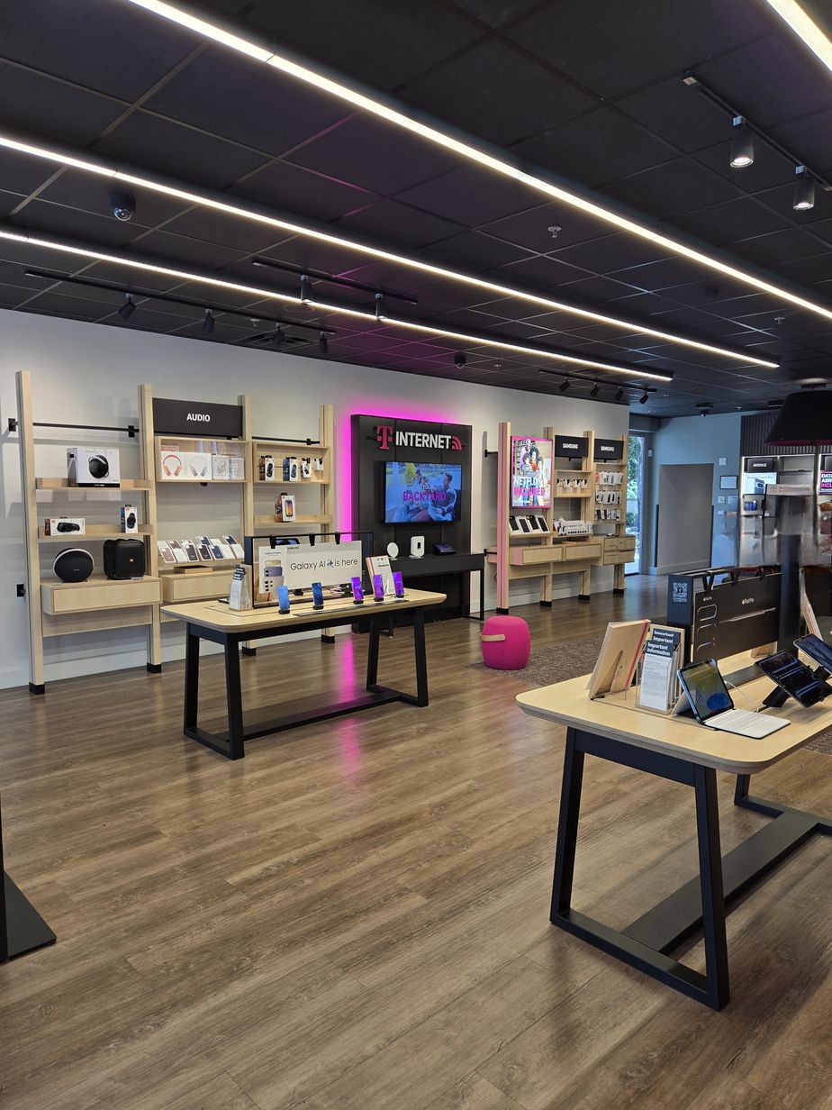 Interior photo of T-Mobile Store at University Dr & Ramblewood Dr, Coral Springs, FL