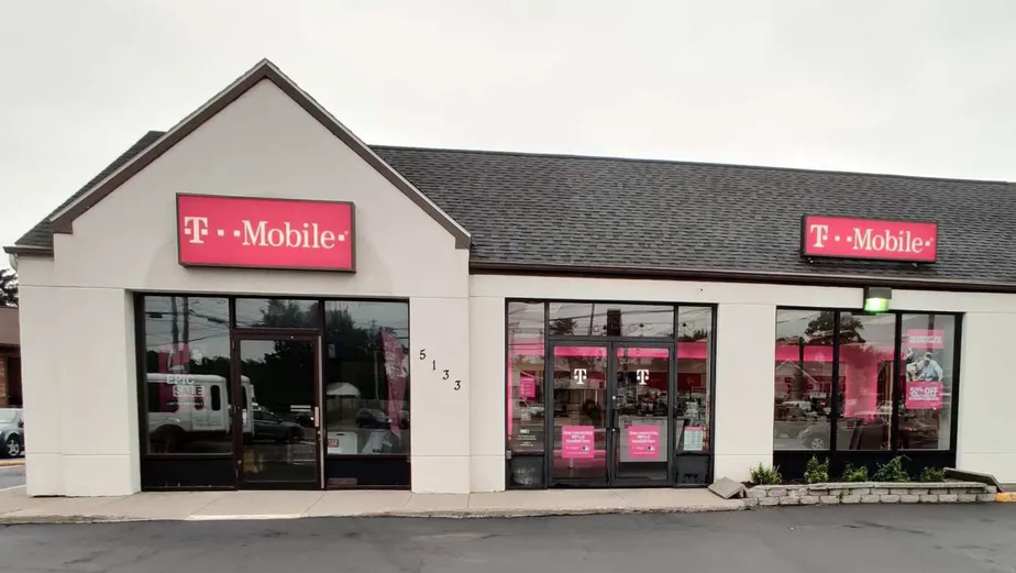 Exterior photo of T-Mobile store at W Taft Rd & Buckley Rd, Liverpool, NY