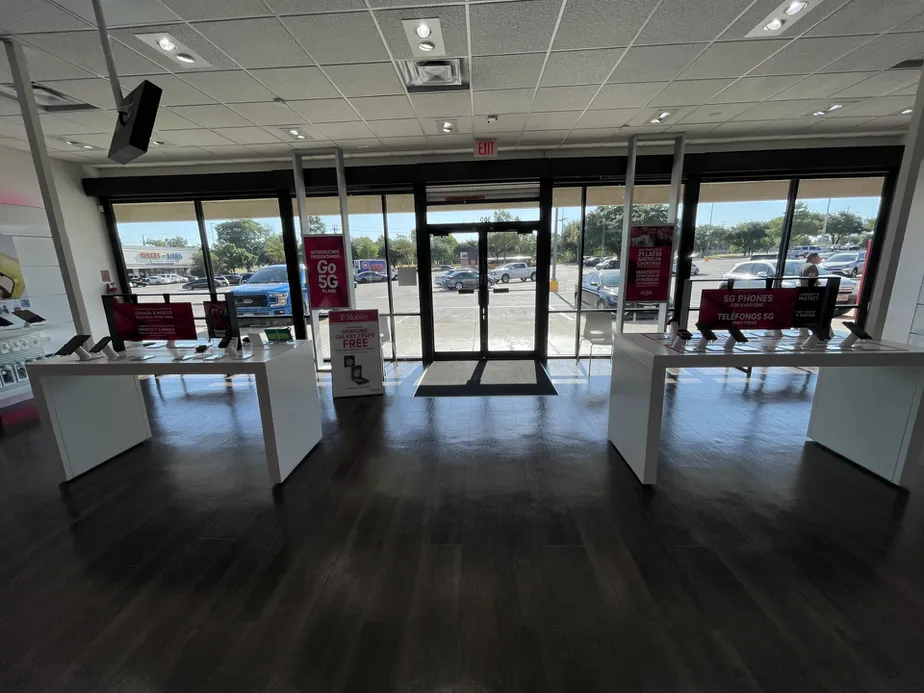 Interior photo of T-Mobile Store at Lombardy & Webb Chapel, Dallas, TX