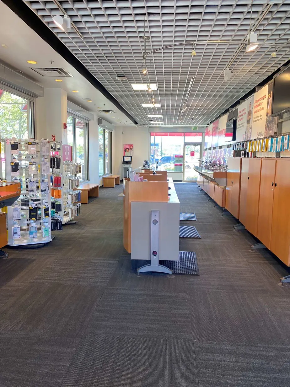 Interior photo of T-Mobile Store at E Cedar Ave & Crystal St, Aurora, CO