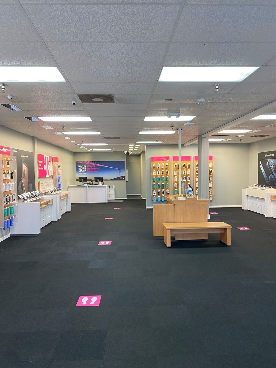 Interior photo of T-Mobile Store at Wickham Rd & W Eau Gallie Blvd, Melbourne, FL