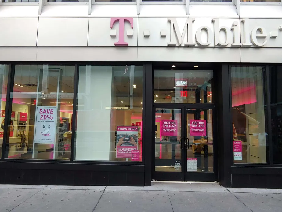 Exterior photo of T-Mobile store at 6th Ave & 46th St, New York, NY