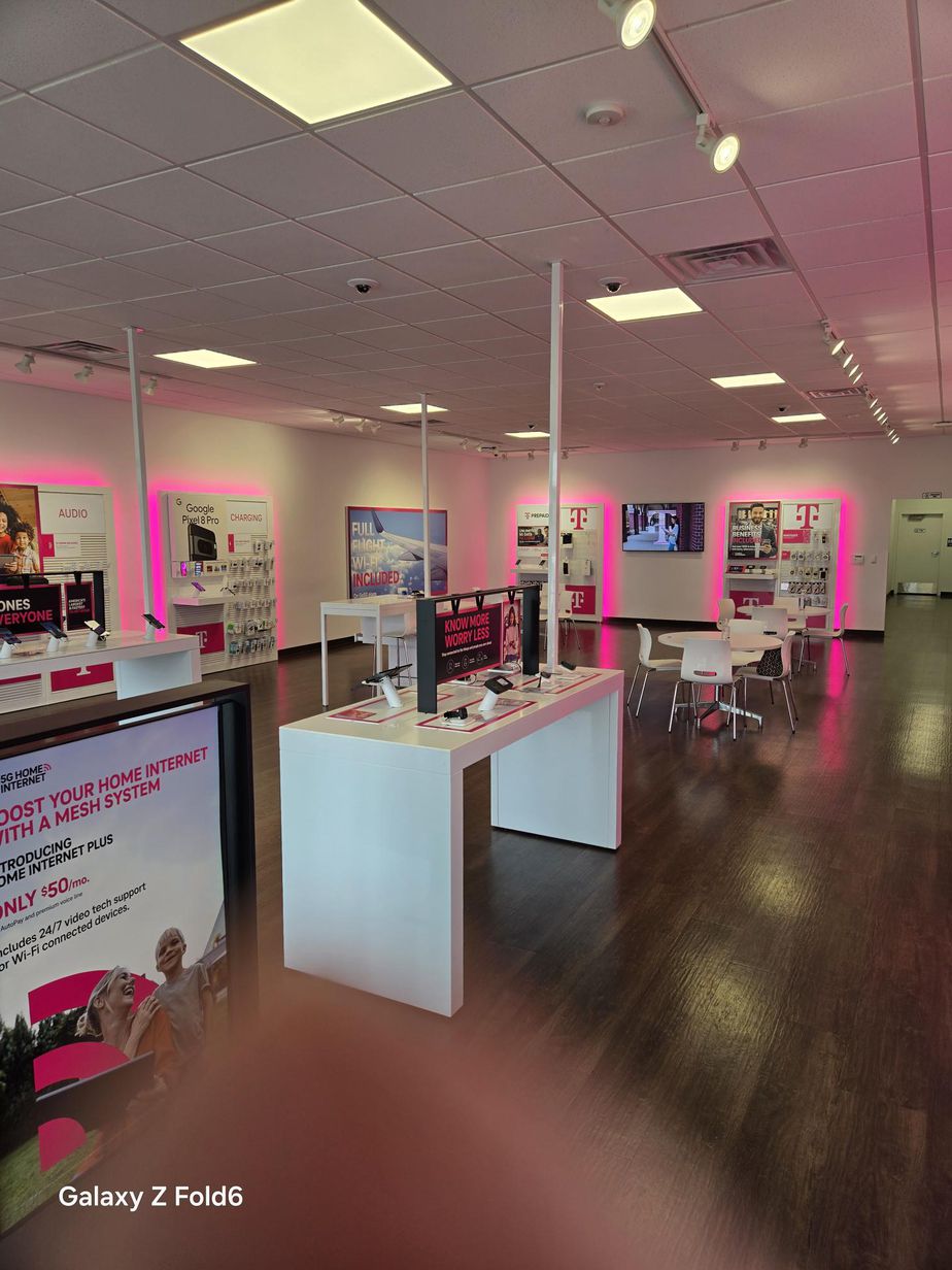 Interior photo of T-Mobile Store at E Ridge Rd & Hudson Ave, Rochester, NY