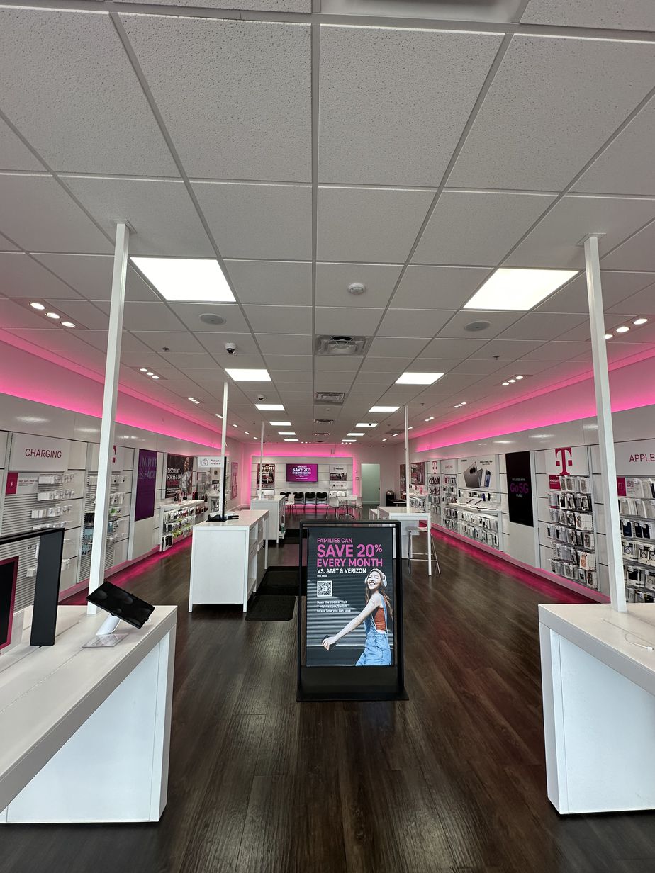 Interior photo of T-Mobile Store at Oxon Hill Rd & Thompson Ln, Oxon Hill, MD