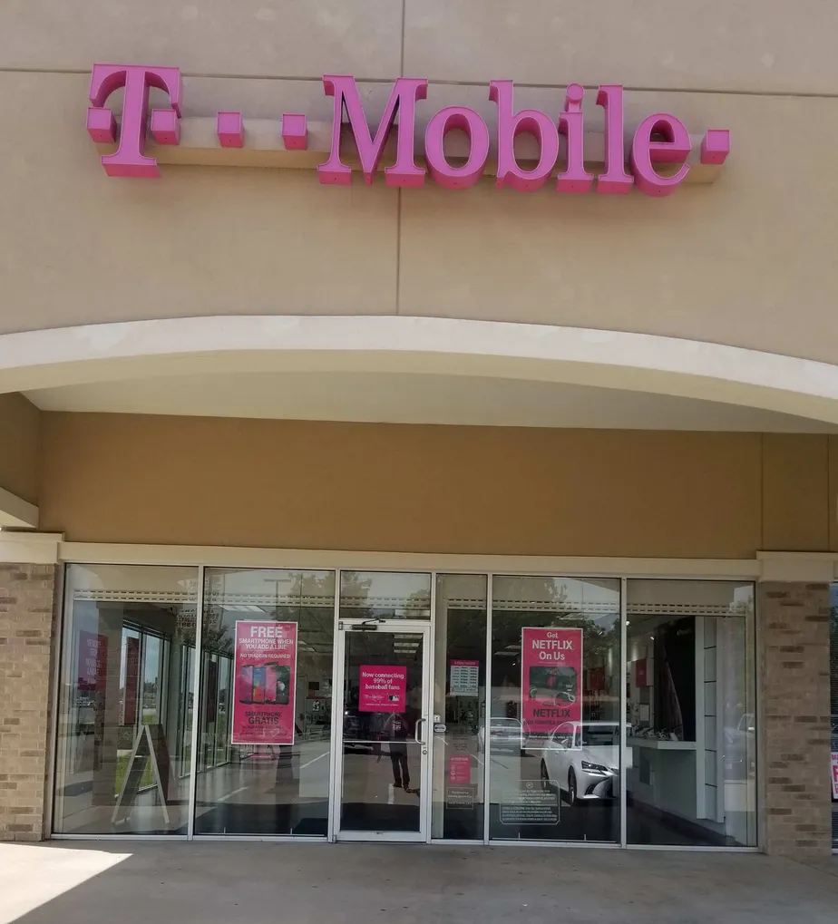 Exterior photo of T-Mobile store at S. Highway 6 & Atterbury Dr., Sugar Land, TX