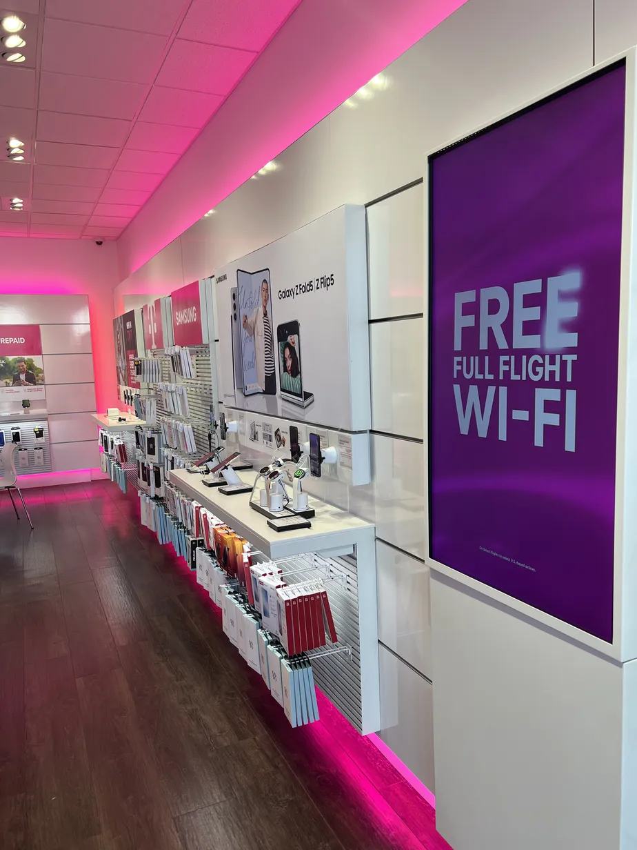 Interior photo of T-Mobile Store at W County Rd B2 & Fairview Ave, Roseville, MN