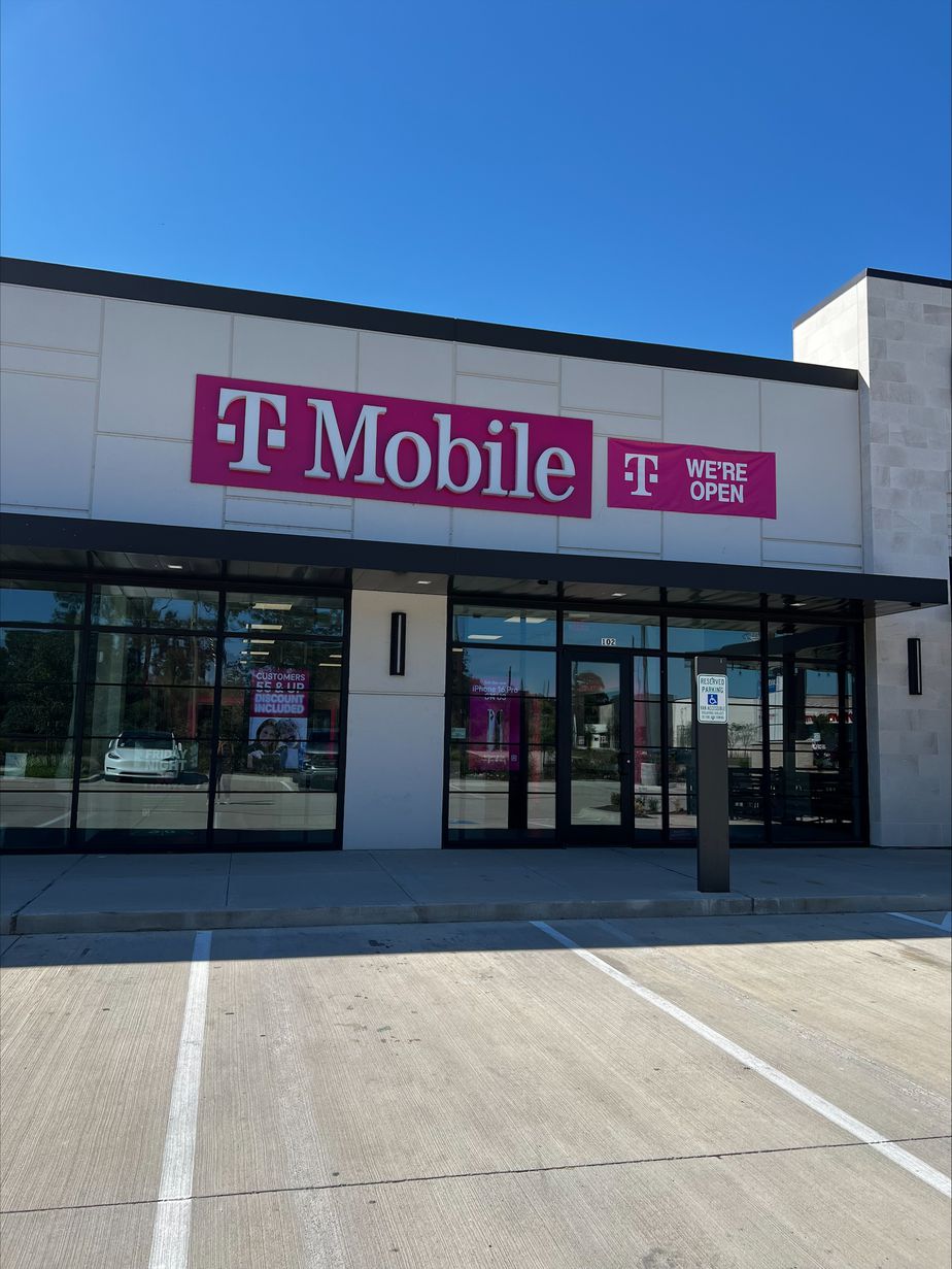 Exterior photo of T-Mobile Store at Magnolia Village, Magnolia, TX