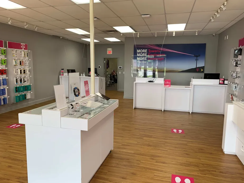 Interior photo of T-Mobile Store at W Vienna Rd & N Linden Rd, Clio, MI