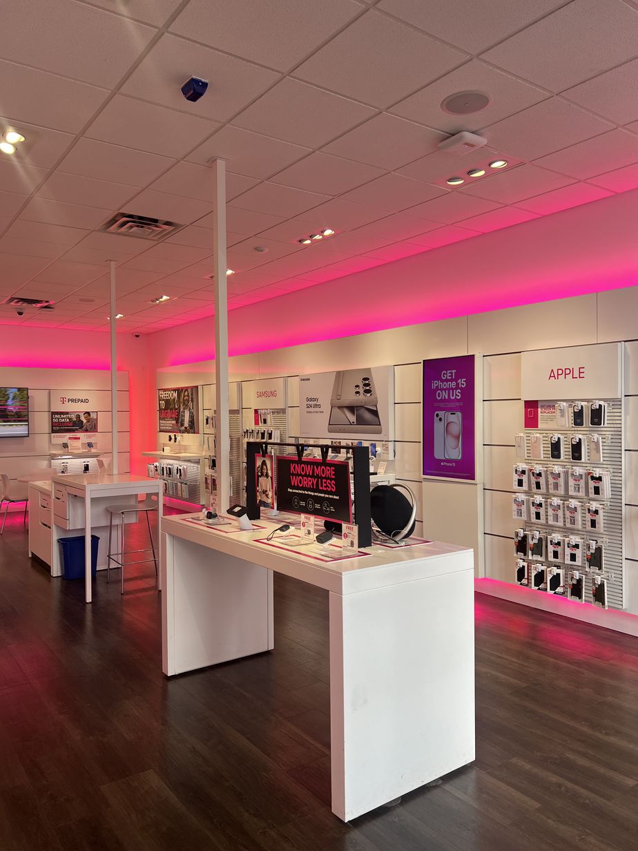 Interior photo of T-Mobile Store at W County Rd B2 & Fairview Ave, Roseville, MN