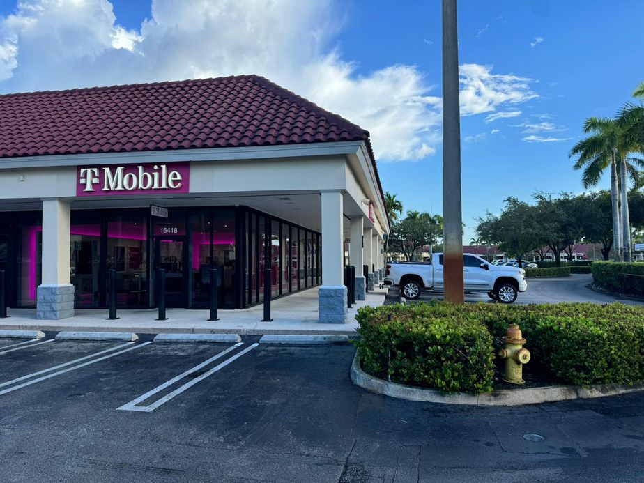 Exterior photo of T-Mobile Store at NW 154th St & Palmetto Expy, Miami Lakes, FL