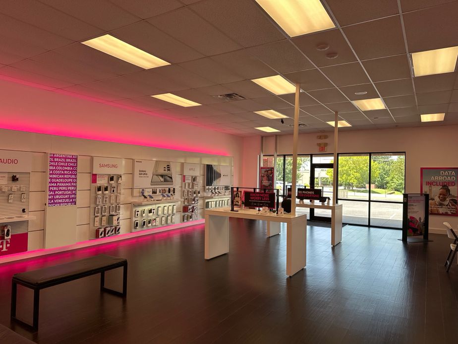 Interior photo of T-Mobile Store at S Elm Place & 121st St, Broken Arrow, OK