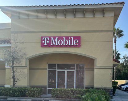 Exterior photo of T-Mobile Store at Taylor Rd & Summer Trees Rd, Port Orange, FL