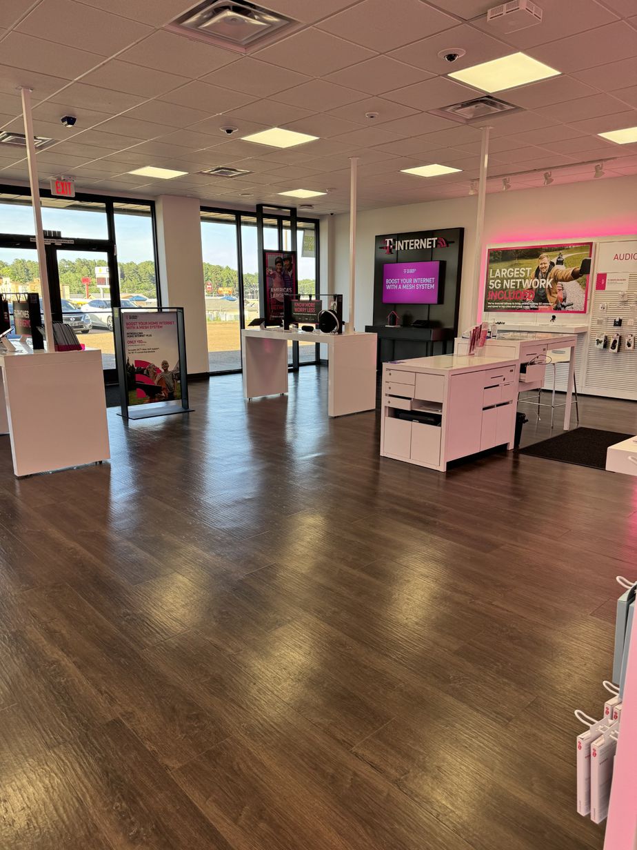 Interior photo of T-Mobile Store at Grenada Plaza, Grenada, MS