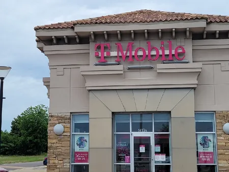  Exterior photo of T-Mobile Store at McFarland & 15th St, Tuscaloosa, AL 
