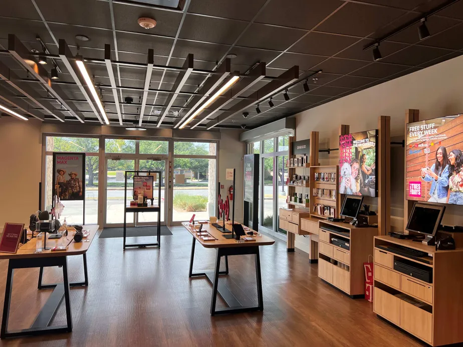 Interior photo of T-Mobile Store at Hulen St & Bellaire Dr S, Fort Worth, TX