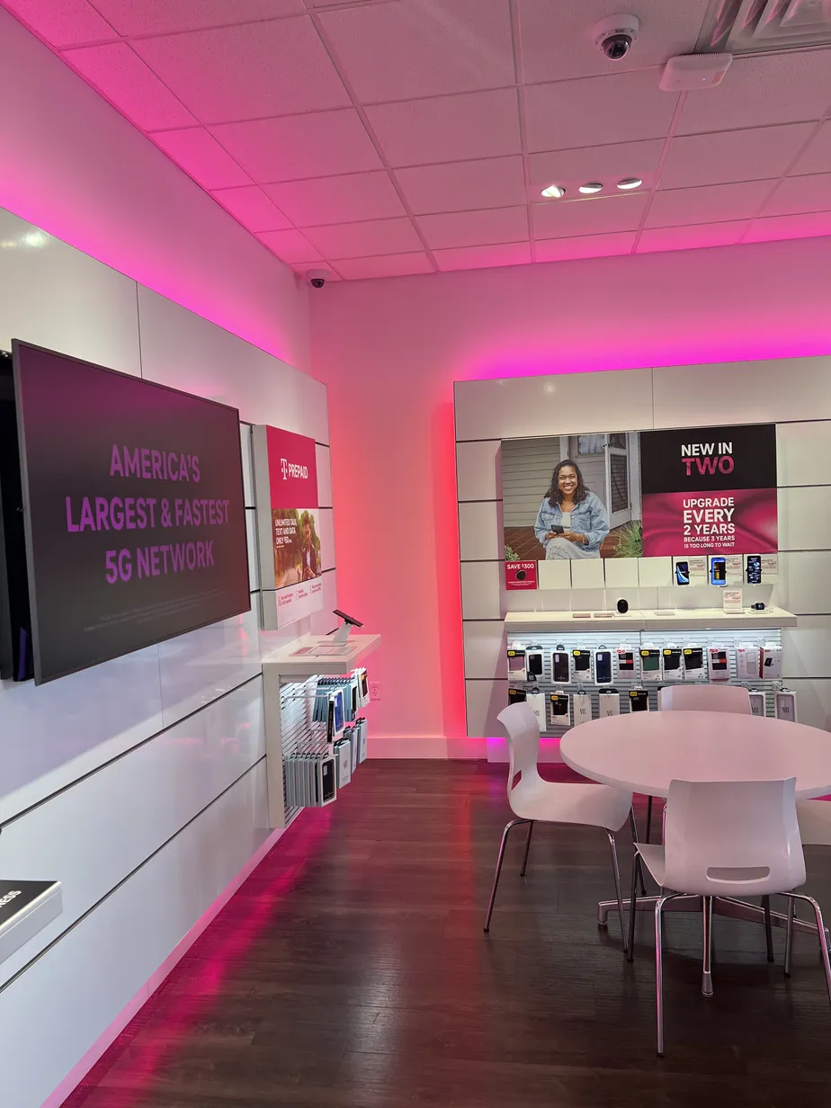 Interior photo of T-Mobile Store at W County Rd B2 & Fairview Ave, Roseville, MN