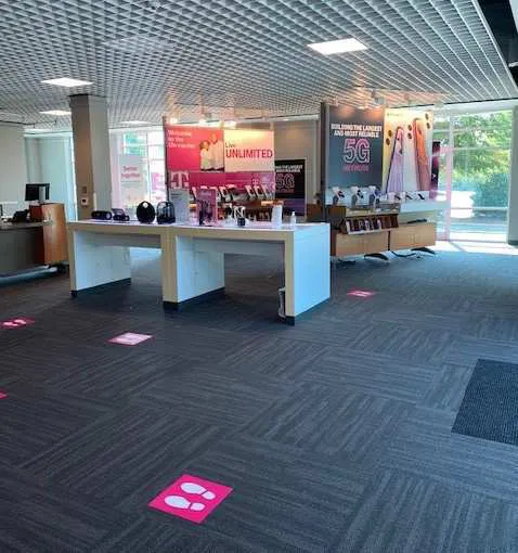 Interior photo of T-Mobile Store at Alexander Promenade Pl & Acc Blvd, Raleigh, NC