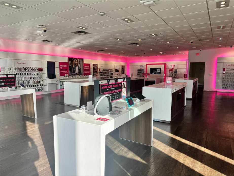 Interior photo of T-Mobile Store at W 49th St & W 8th Ave, Hialeah, FL