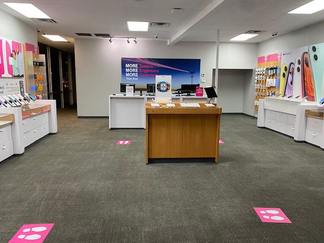 Interior photo of T-Mobile Store at Old Canoe Creek Rd & 5th St, Saint Cloud, FL