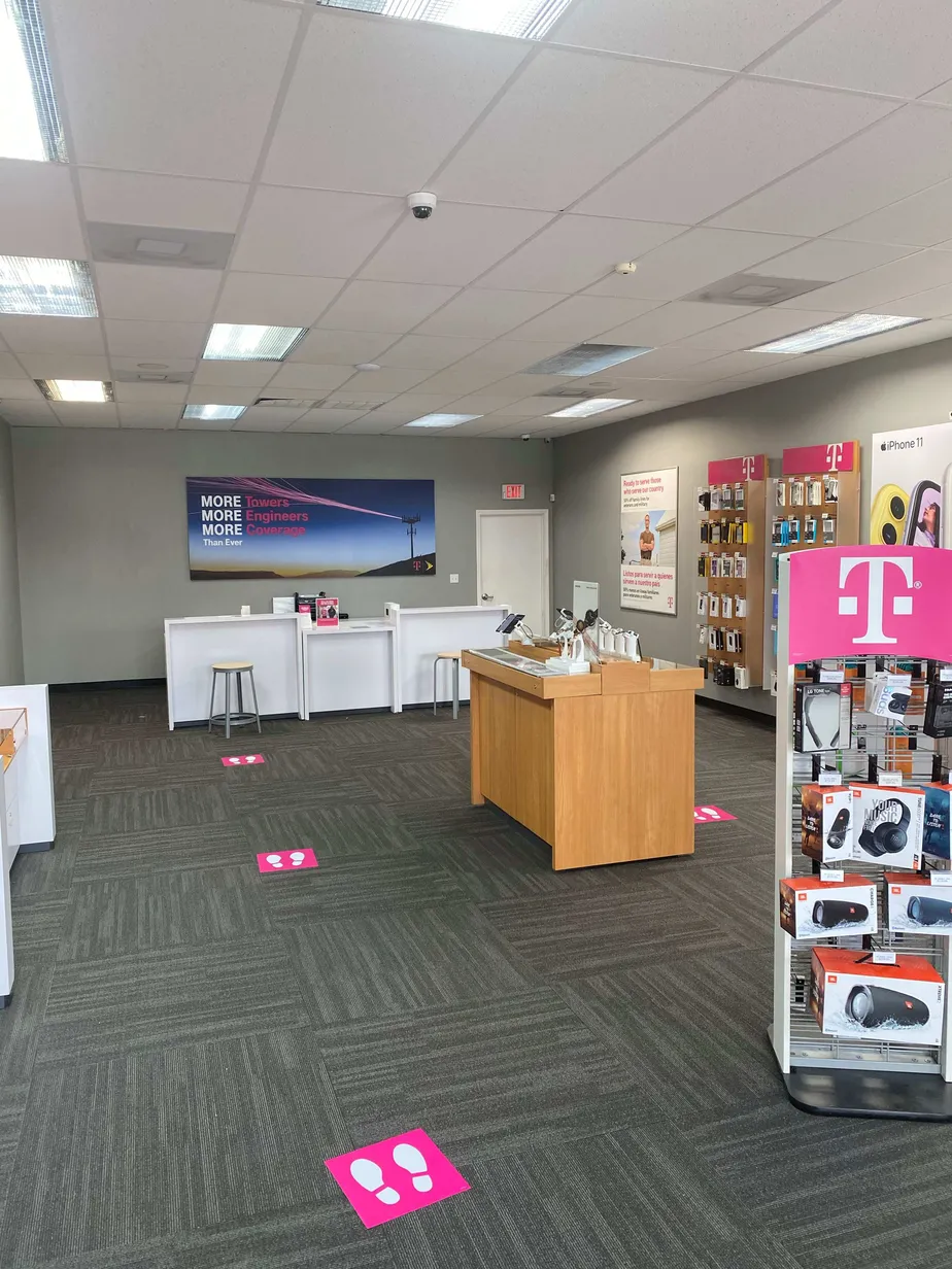 Interior photo of T-Mobile Store at Sawdust Rd & Borough Park Dr, Spring, TX