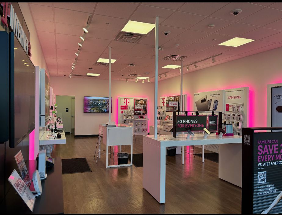 Interior photo of T-Mobile Store at Blues Hwy & 2nd Ave, Muscatine, IA