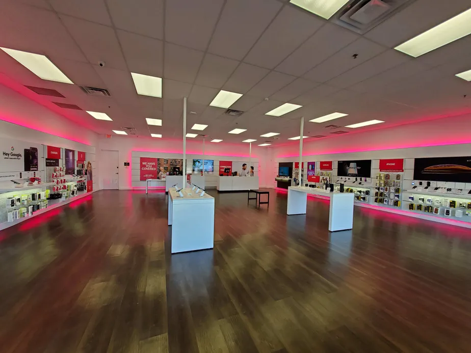 Interior photo of T-Mobile Store at Highland Ave & W Commerce St, Milford, MI