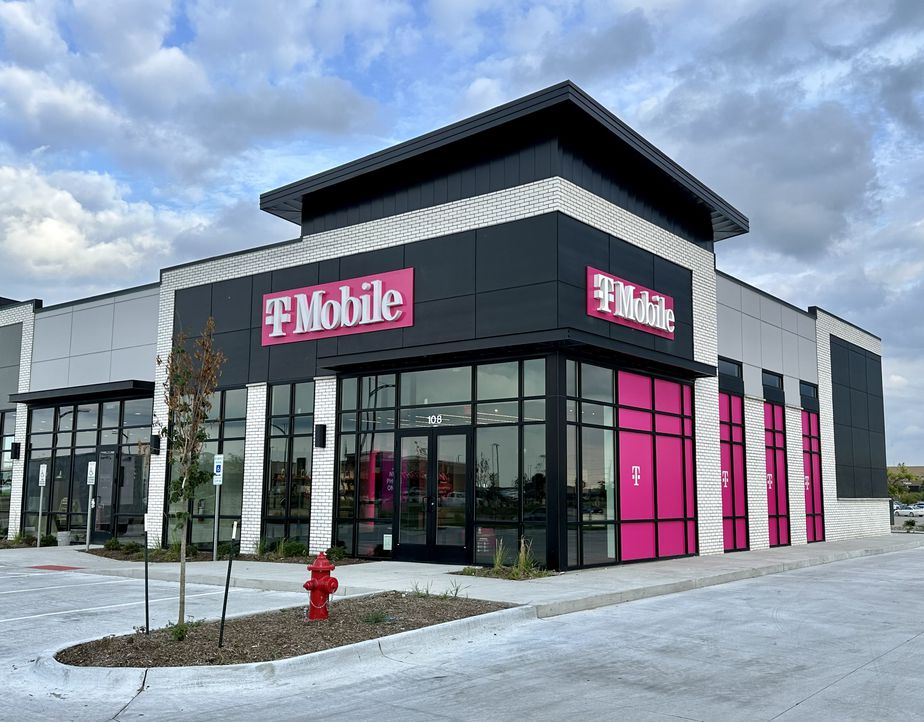 Exterior photo of T-Mobile Store at E 1st St & SE Grimes Blvd, Grimes, IA