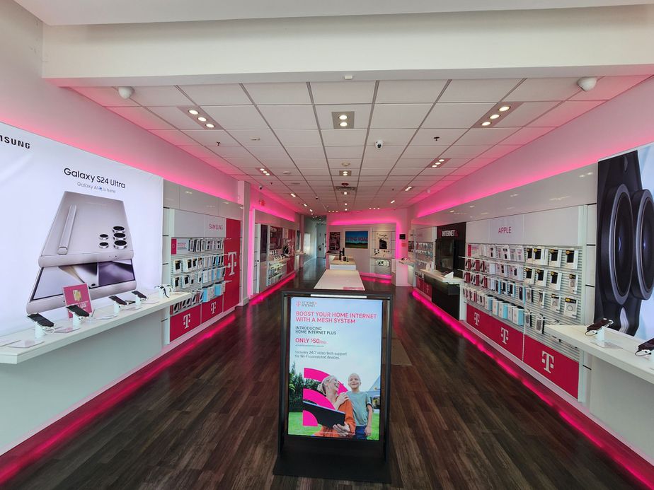 Interior photo of T-Mobile Store at Jericho Tnpk & Florence Ave, Syosset, NY
