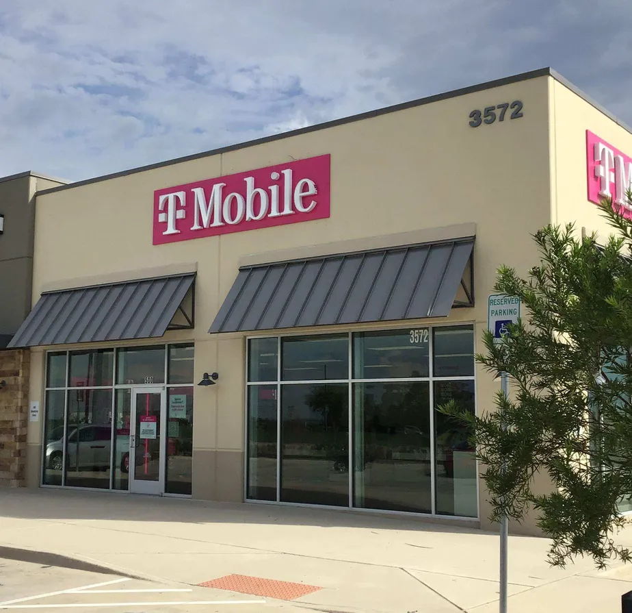 Exterior photo of T-Mobile store at Hwy 114 & Allison Ave, Fort Worth, TX