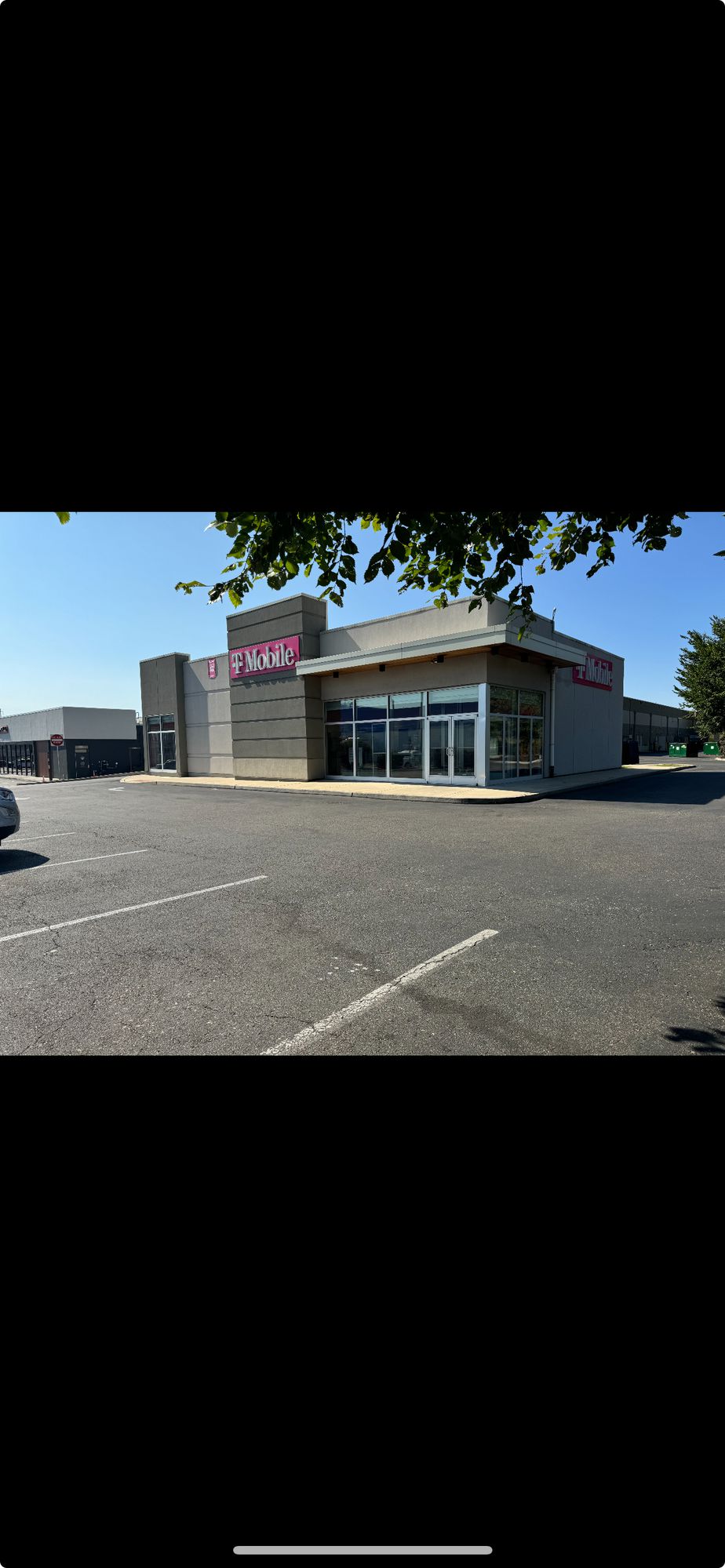 Exterior photo of T-Mobile Store at Roberts Ave & Fox St, Philadelphia, PA