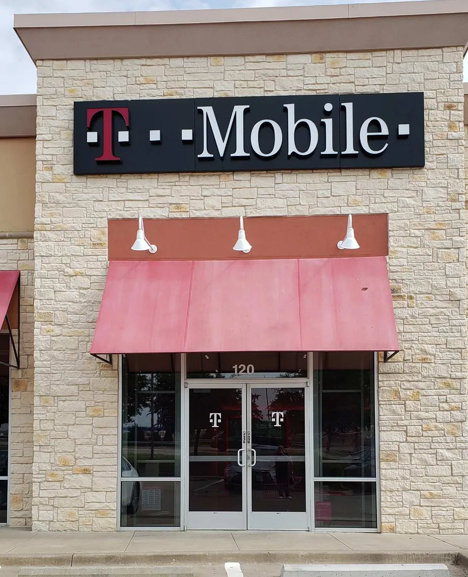 Exterior photo of T-Mobile store at Hwy 190 & Old Denton, Carrollton, TX