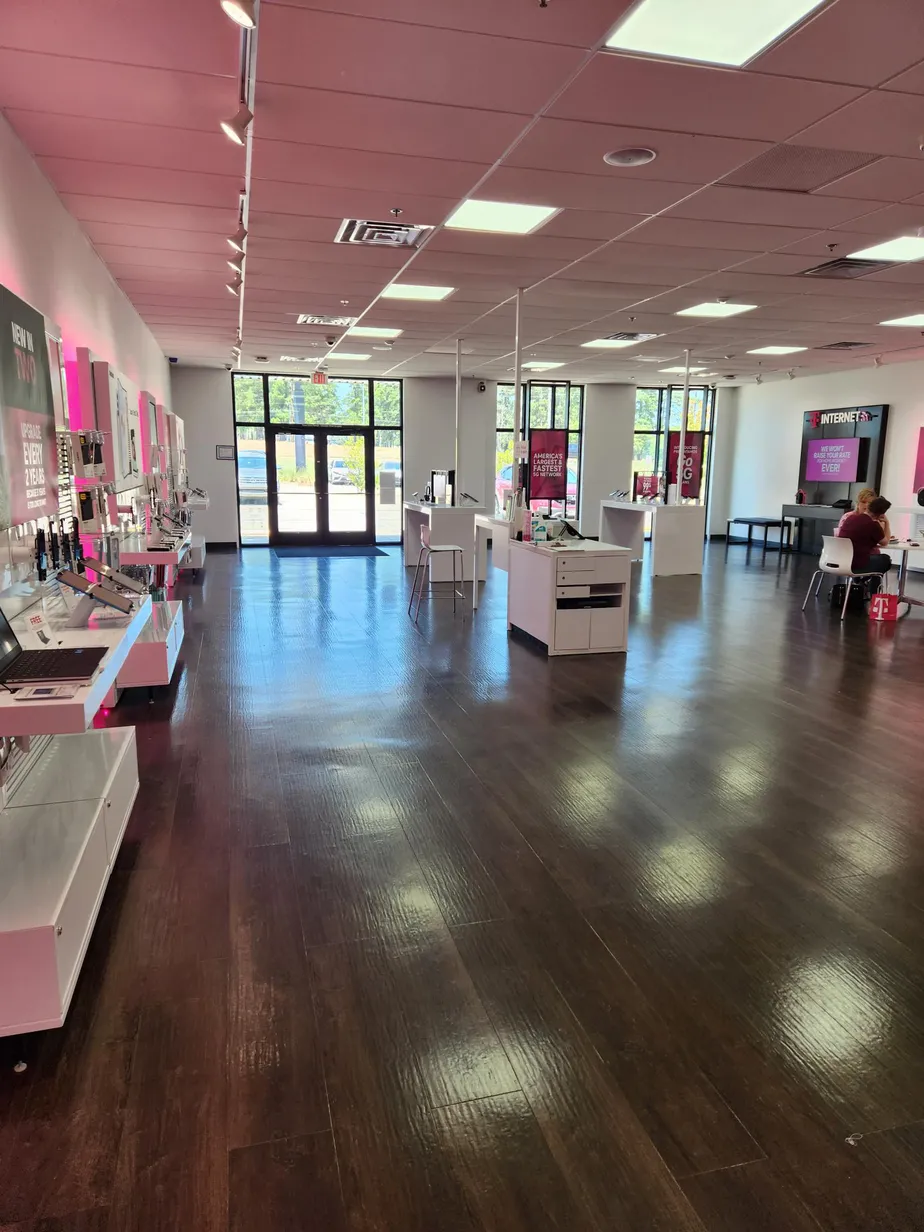Interior photo of T-Mobile Store at Loop 281 & Clay Dr, Longview, TX