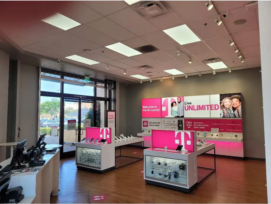 Interior photo of T-Mobile Store at Jeffrey Rd & Roosevelt, Irvine, CA
