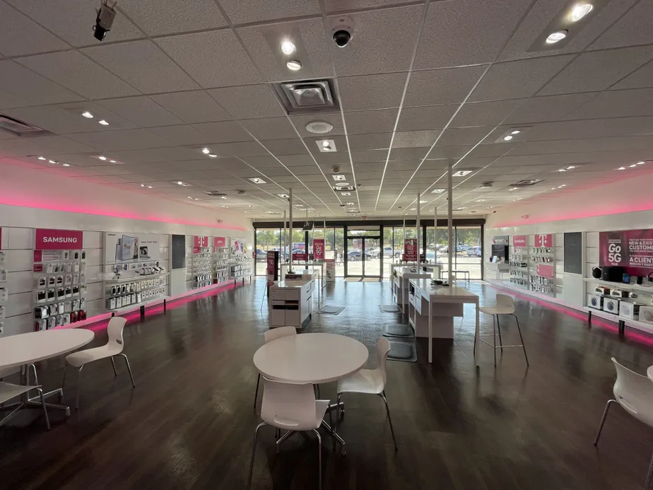 Interior photo of T-Mobile Store at Lombardy & Webb Chapel, Dallas, TX