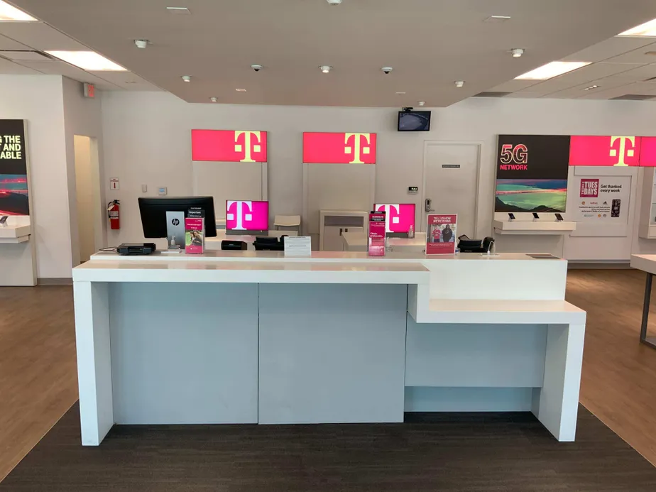Interior photo of T-Mobile Store at Addison Rd & Belt Line Rd, Addison, TX