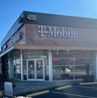 Exterior photo of T-Mobile store at Shelbyville Rd & S Hubbards Ln, Louisville, KY