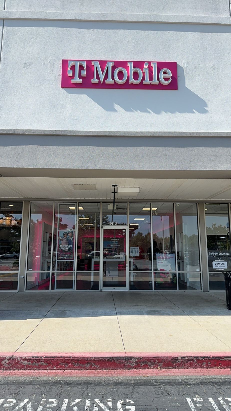 Exterior photo of T-Mobile Store at State Bridge, Alpharetta, GA