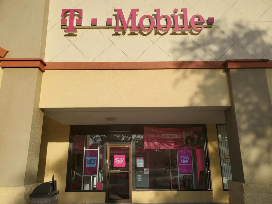 Exterior photo of T-Mobile store at Commercial Way & Trenton Ave, Spring Hill, FL
