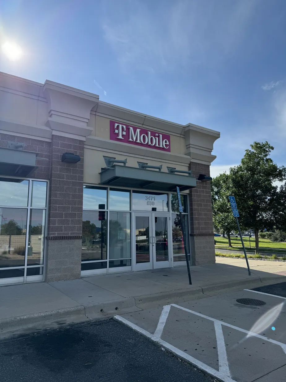  Exterior photo of T-Mobile Store at I-70 & Tower Rd, Aurora, CO 