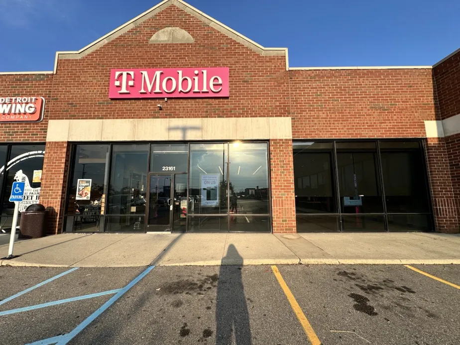  Exterior photo of T-Mobile Store at Allen Rd & West Rd, Woodhaven, MI 