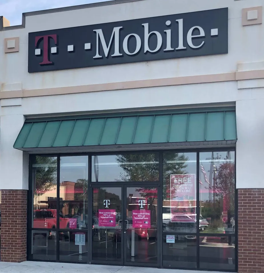 Exterior photo of T-Mobile store at Bayou Blvd & 9th Ave, Pensacola, FL