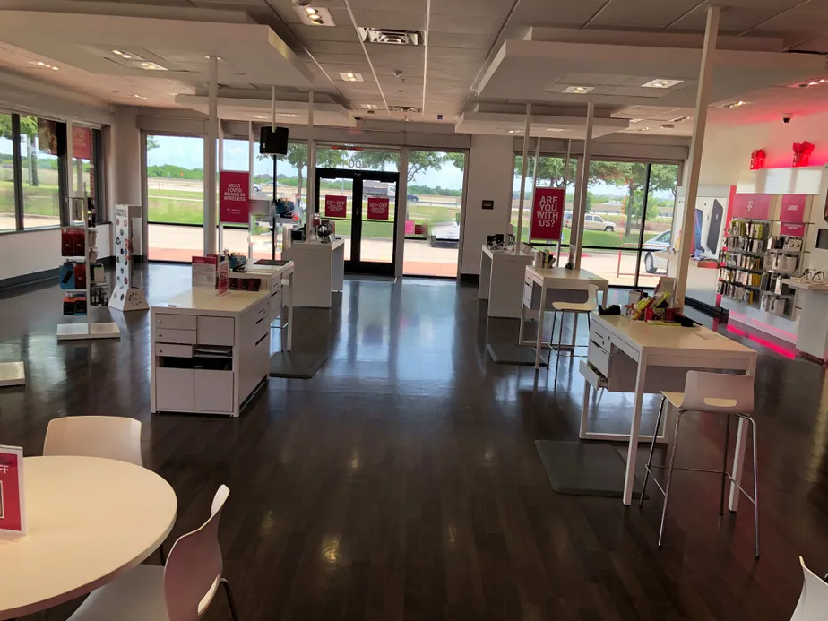Interior photo of T-Mobile Store at 121 & Custer, McKinney, TX