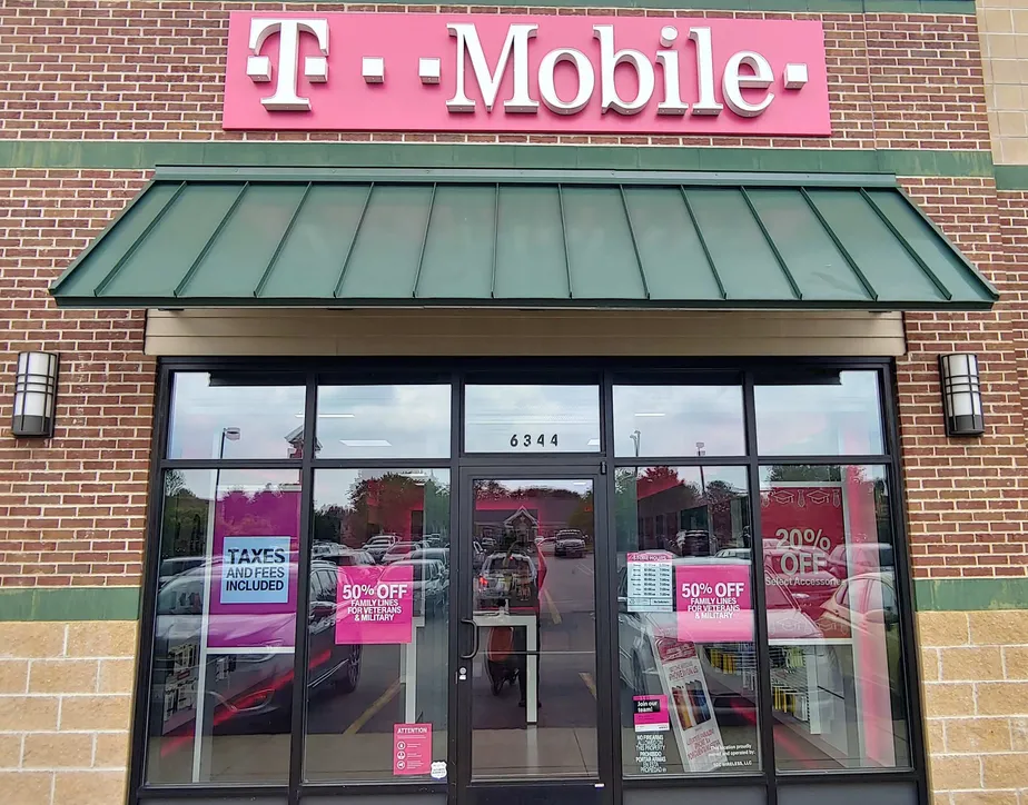 Exterior photo of T-Mobile store at E Riverside Blvd & Sinkiawic Pkwy, Loves Park, IL