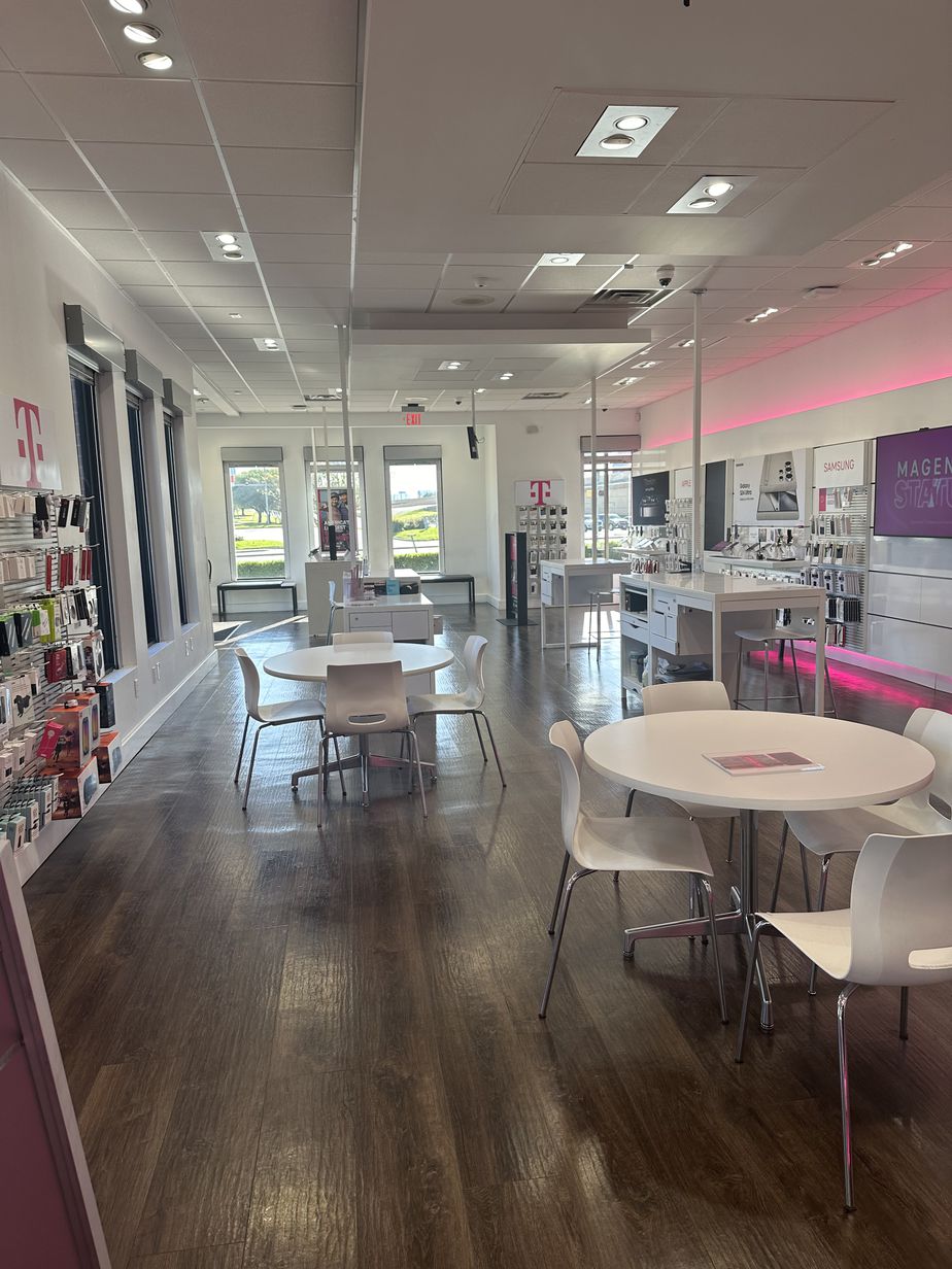 Interior photo of T-Mobile Store at Midway & 635, Farmers Branch, TX