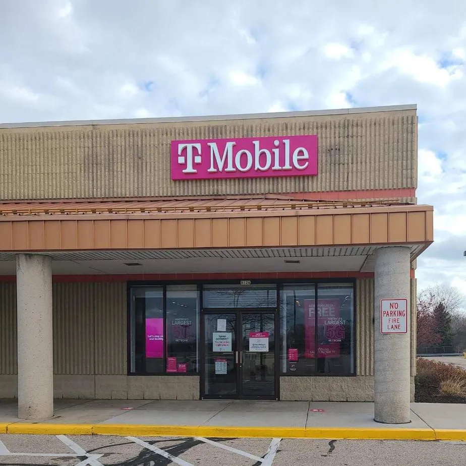 Exterior photo of T-Mobile store at N Green Bay Rd & N Deerwood Dr, Brown Deer, WI